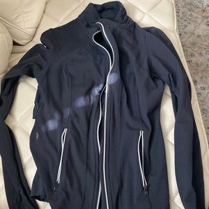 Lululemon jacket size 8 but fits smaller. In good condition